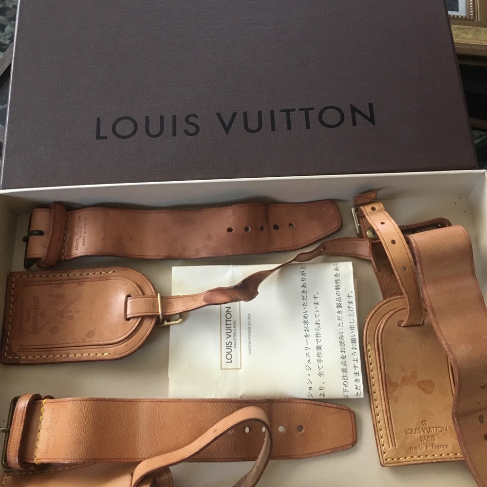 Louis Vuitton luggage /bag name tag 3 sets with box . Each set $69 no box.